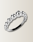 Anillo de bolitas con diamante