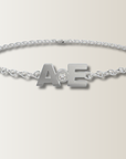 Brazalete de letras con diamante