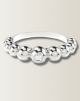 Anillo de bolitas con diamante