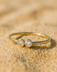 Anillo con dos diamantes
