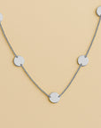 Collar de placas redondas