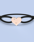 Brazalete de corazón con cordón de satén