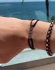 Amsterdam bracelet gold armband voor mannen van Odile met zwart koord en gouden details