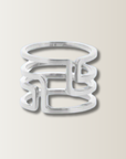 Odile silver geometric open band ring with modern maze-like design