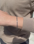 Tennis armband with black diamonds