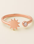 Open band ring with diamond