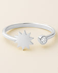 Open band ring with diamond