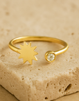 Open band ring with diamond