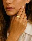 Open band ring with diamond