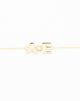 Brazalete de letras con diamante