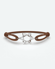 Odile Herenarmband met een stervormig metalen accent en een leren band in bruin
