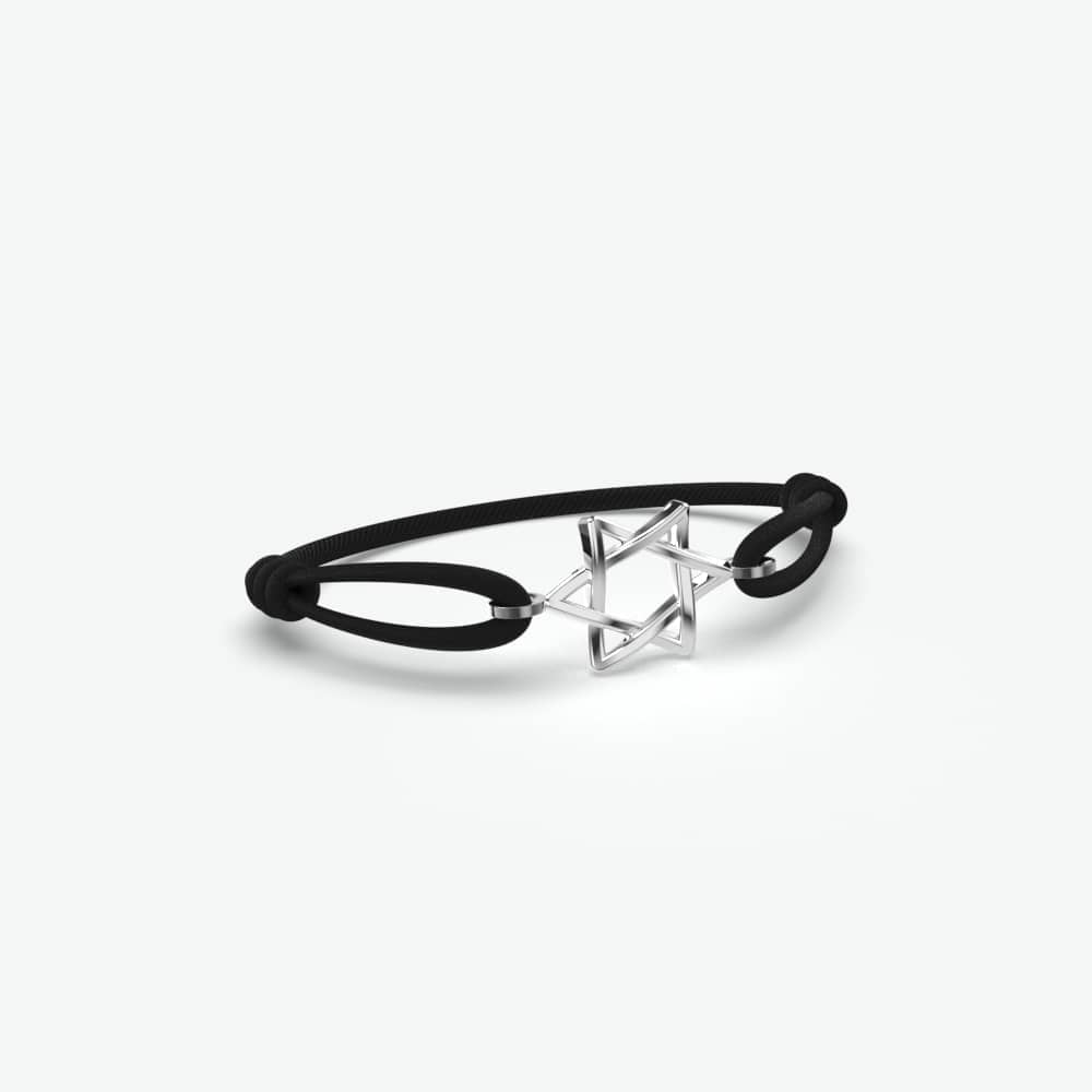 Zwarte elastische armband voor mannen met een zilveren sterretje van Odile
