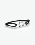 Zwarte elastische armband voor mannen met een zilveren sterretje van Odile